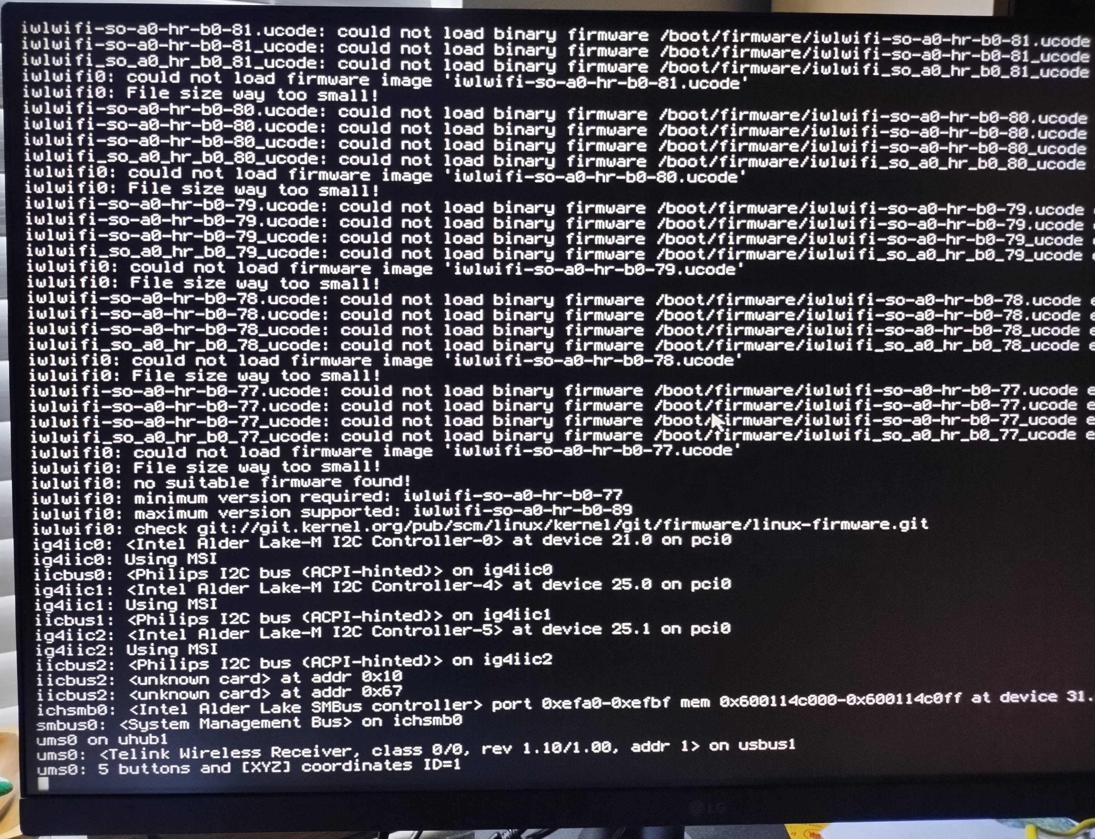 FreeBSD boot up sequence showing that Intel WiFi iwlwifi firmware was not present.
