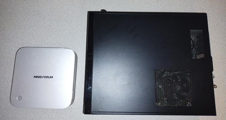 Top down comparison of the X1 Pro and a 2013 HP office desktop.